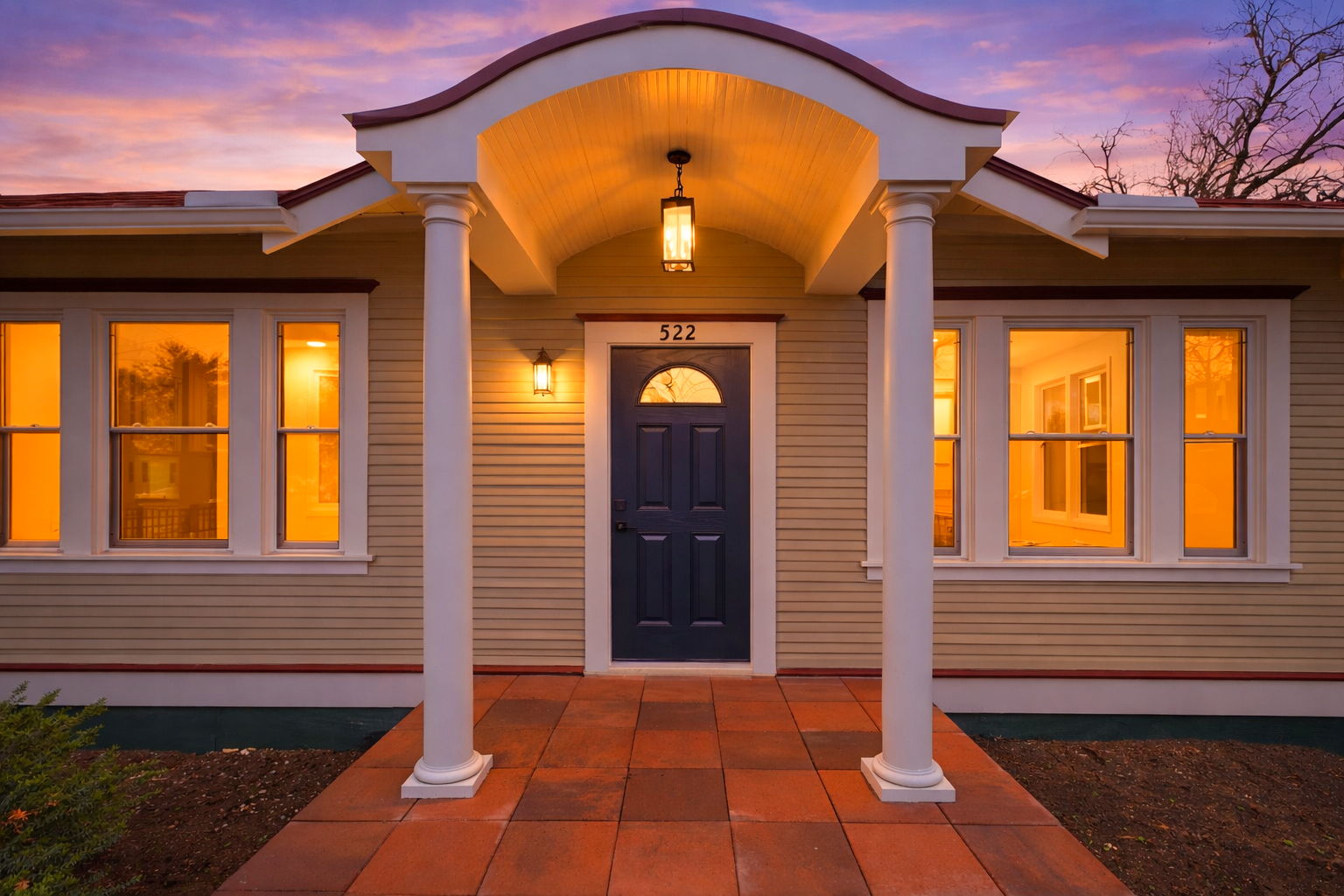 Evergreen Arched Front Porch at Twilight — Evergreen Front Porch remodeling by Wright Touch Construction in the Texas Hill Country
