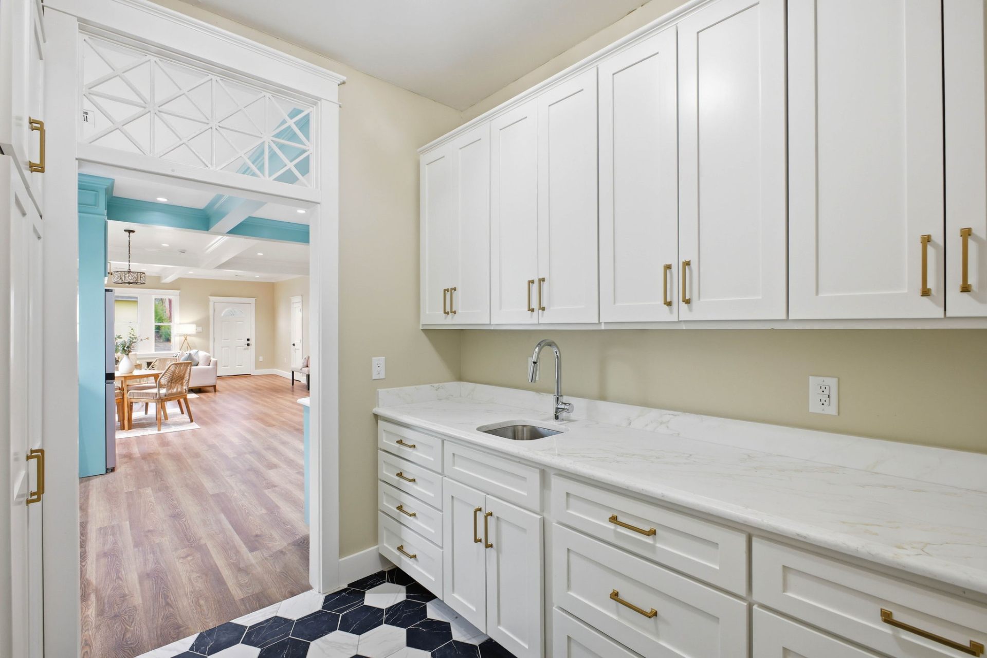 Evergreen Butler's Pantry with Marble Counters — Evergreen Butler's Pantry remodeling by Wright Touch Construction in the Texas Hill Country